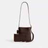 Borsa a secchiello Bleecker 21 in Signature Canvas