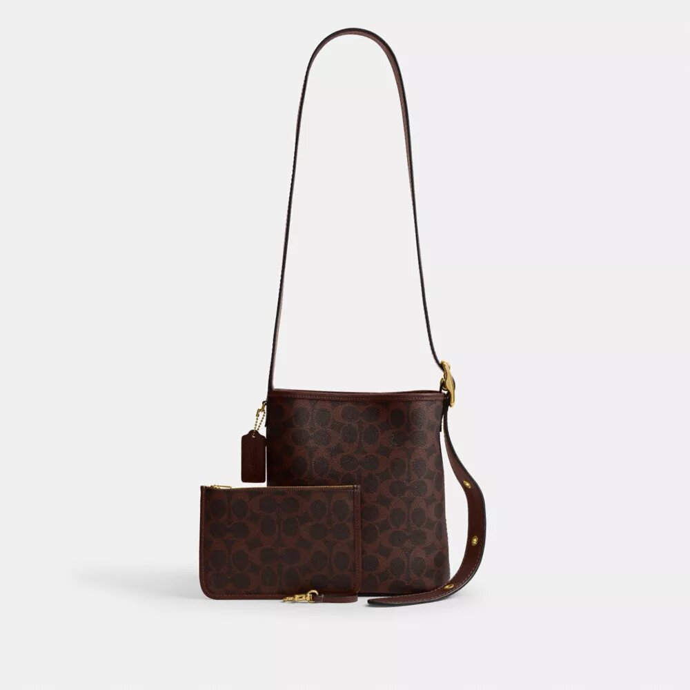 Borsa a secchiello Bleecker 21 in Signature Canvas