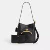 Borsa a secchiello Bleecker con chiusura Kisslock