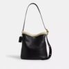 Borsa a secchiello Bleecker in shearling