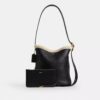 Borsa a secchiello Bleecker in shearling