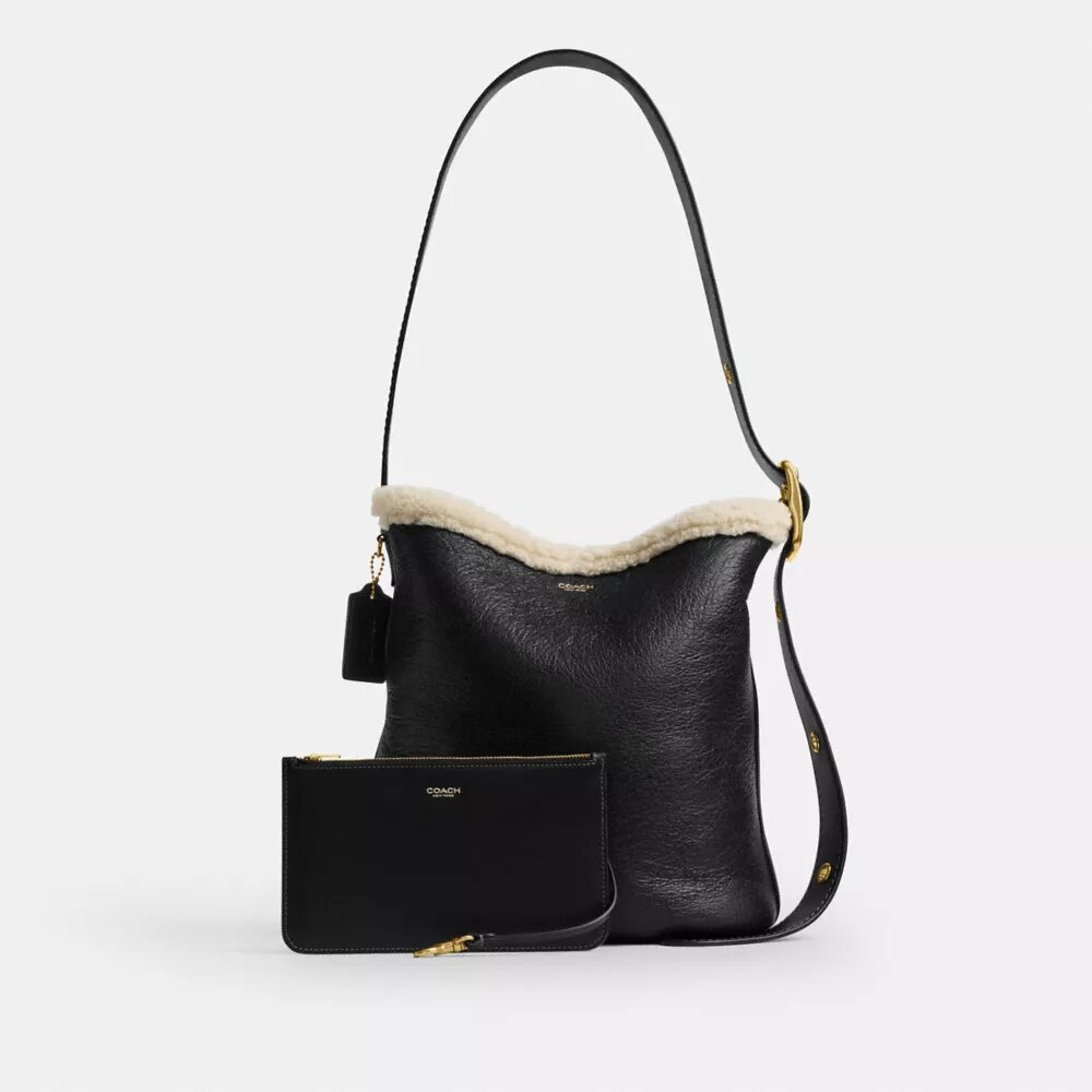 Borsa a secchiello Bleecker in shearling