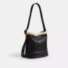Borsa a secchiello Bleecker in shearling