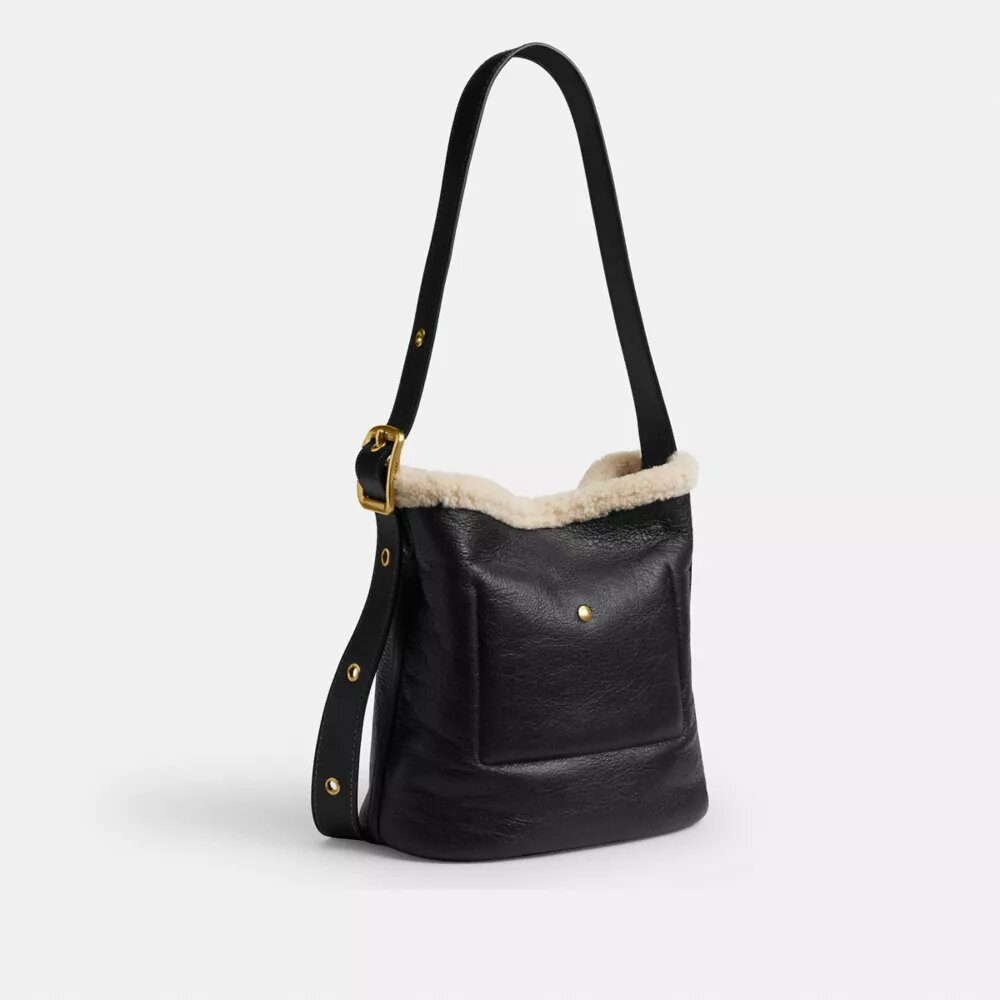 Borsa a secchiello Bleecker in shearling