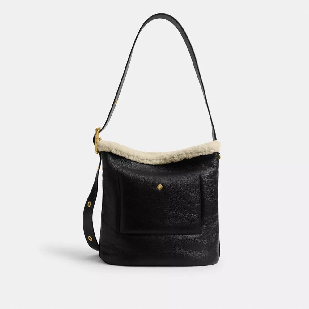 Borsa a secchiello Bleecker in shearling