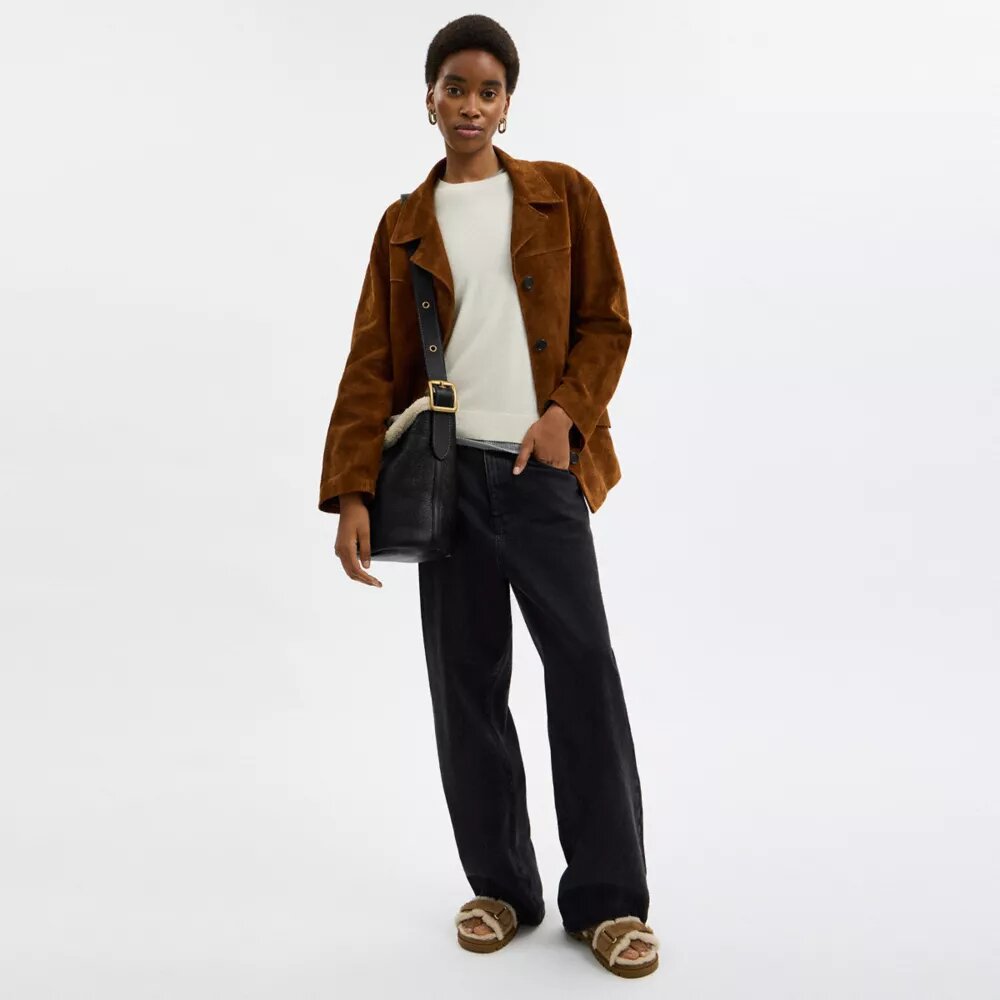 Borsa a secchiello Bleecker in shearling