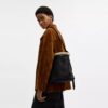 Borsa a secchiello Bleecker in shearling