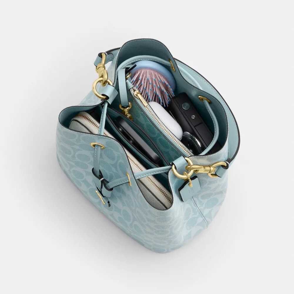 Borsa a secchiello Rowan in Signature Canvas
