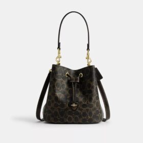 Borsa a secchiello Rowan in Signature Canvas con ciondoli