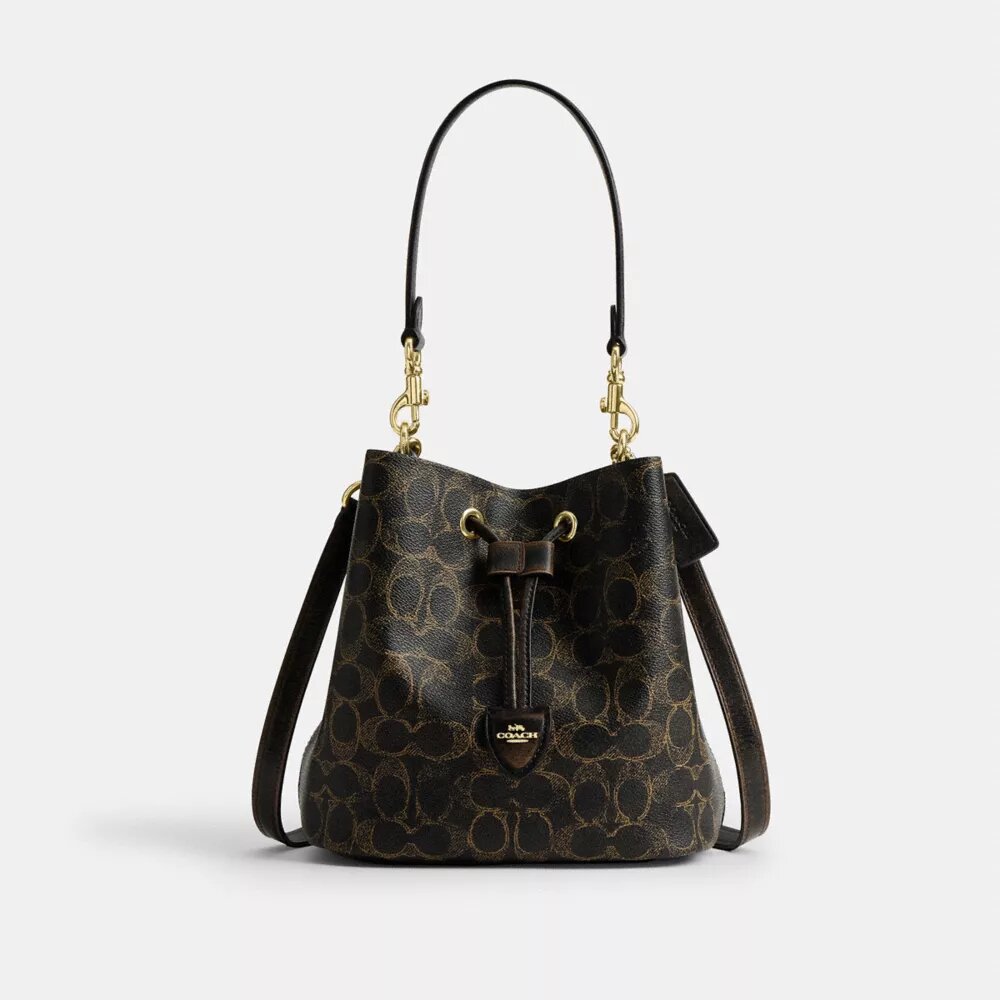 Borsa a secchiello Rowan in Signature Canvas con ciondoli