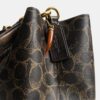 Borsa a secchiello Rowan in Signature Canvas con ciondoli