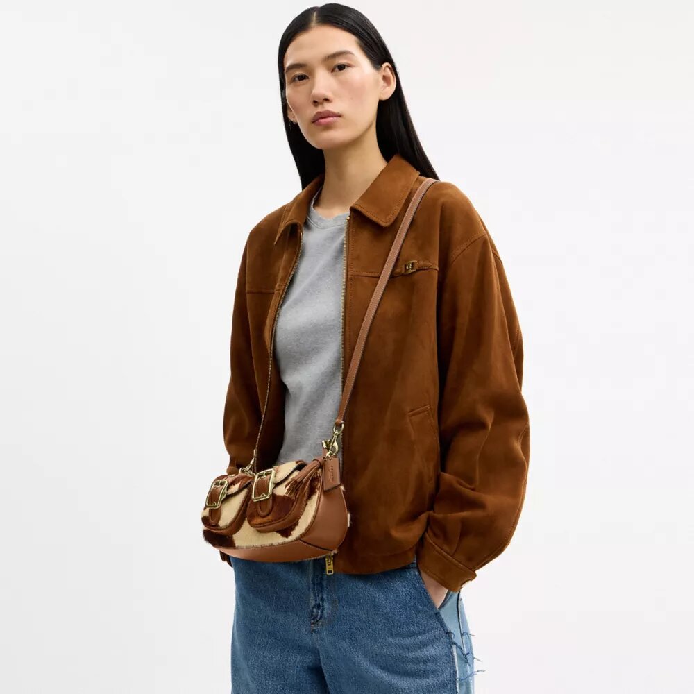 Borsa a spalla Ashton in pelle di vitello con stampa bovina