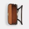 Borsa a spalla Bridget in Signature Canvas con ciondoli