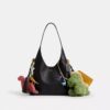 Borsa a spalla Brooklyn 28 con ciondoli per il 10° compleanno di Rexy