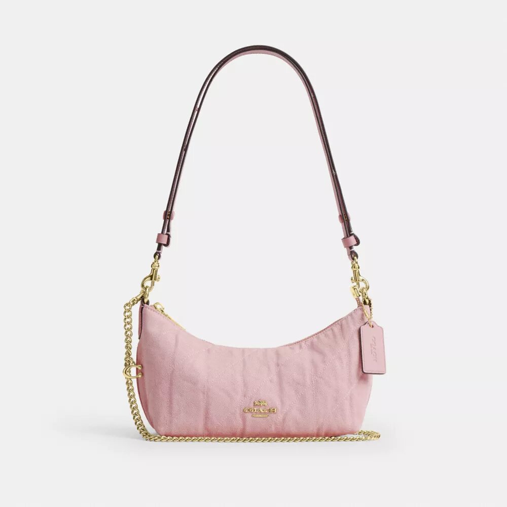 Borsa a spalla Caitlin in cotone rigenerato con trapuntatura e ciondolo