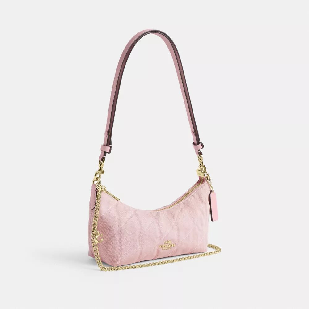 Borsa a spalla Caitlin in cotone rigenerato con trapuntatura e ciondolo