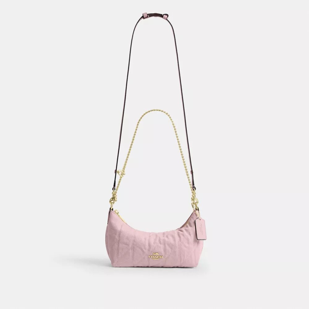 Borsa a spalla Caitlin in cotone rigenerato con trapuntatura e ciondolo