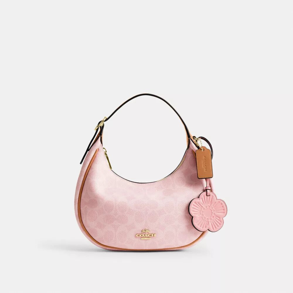 Borsa a spalla Emily in Signature Canvas con ciondoli