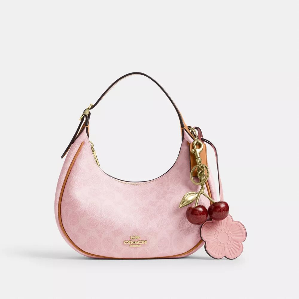 Borsa a spalla Emily in Signature Canvas con ciondoli
