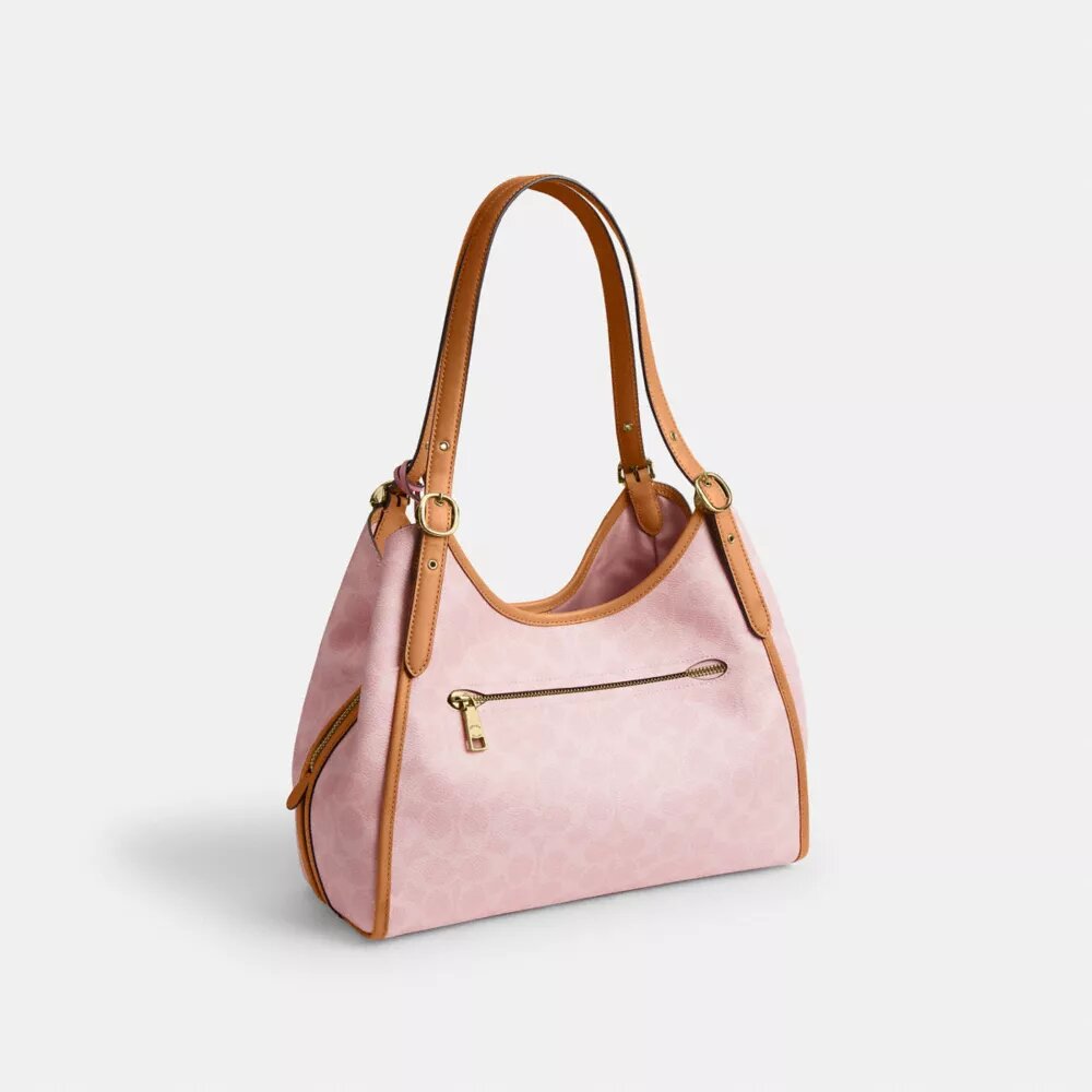 Borsa a spalla Erin in Signature Canvas con ciondoli