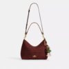 Borsa a spalla Laurel con ciondoli