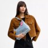 Borsa a spalla Laurel in denim effetto vissuto con ciondoli