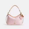 Borsa a spalla Laurel in Signature Canvas con ciondoli