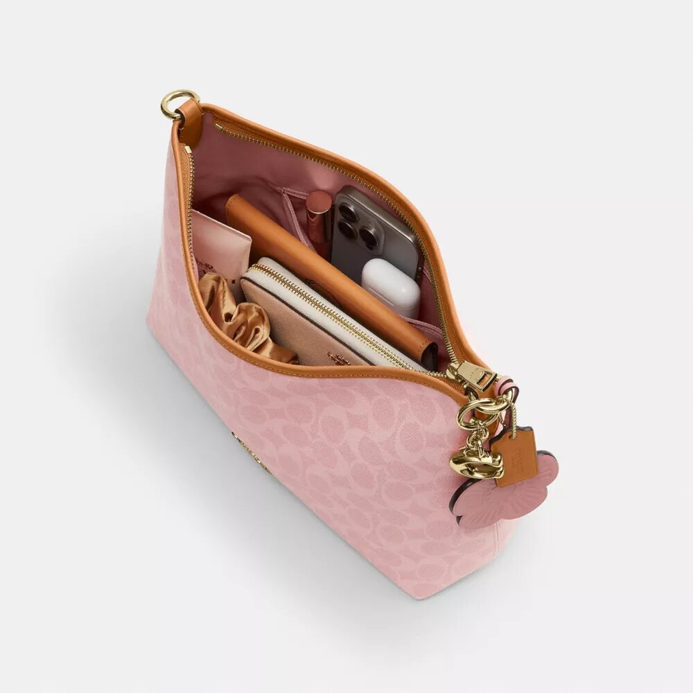 Borsa a spalla Laurel in Signature Canvas con ciondoli