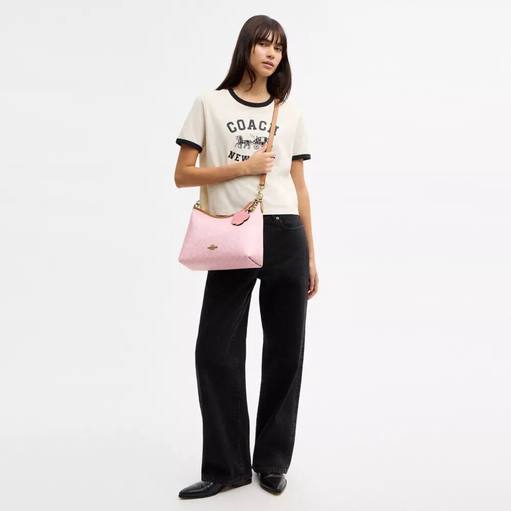 Borsa a spalla Laurel in Signature Canvas con ciondoli