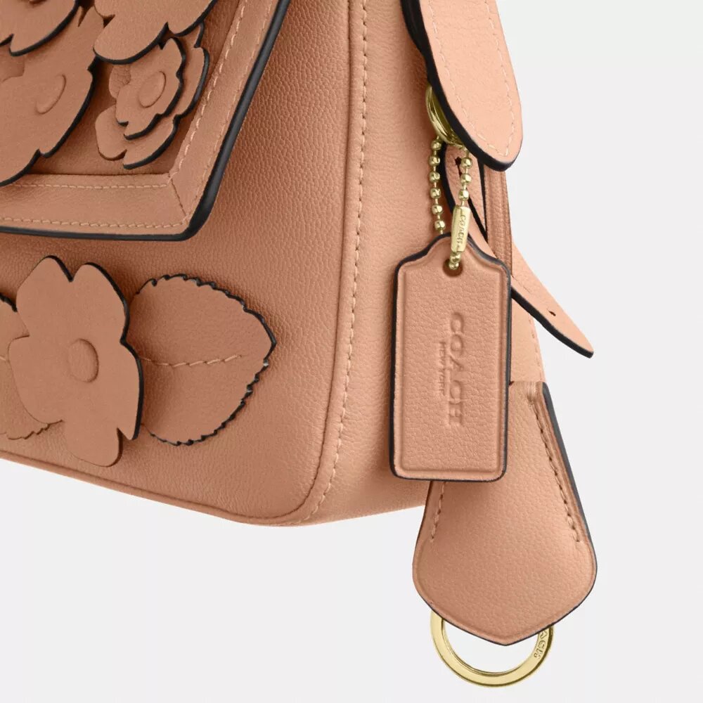 Borsa a spalla piccola Etta con patta e applicazione floreale