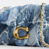 Borsa a spalla Tabby 26 con trapuntatura patchwork in denim riciclato