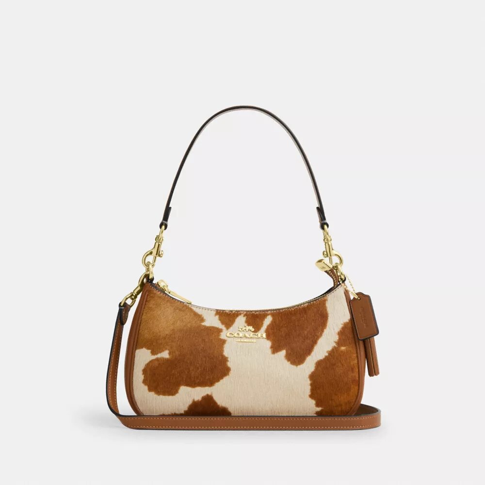 Borsa a spalla Teri in pelle di vitello con stampa bovina