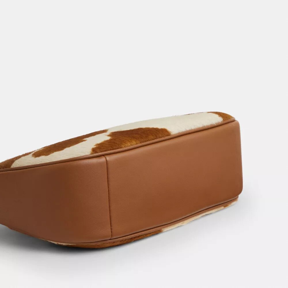 Borsa a spalla Teri in pelle di vitello con stampa bovina