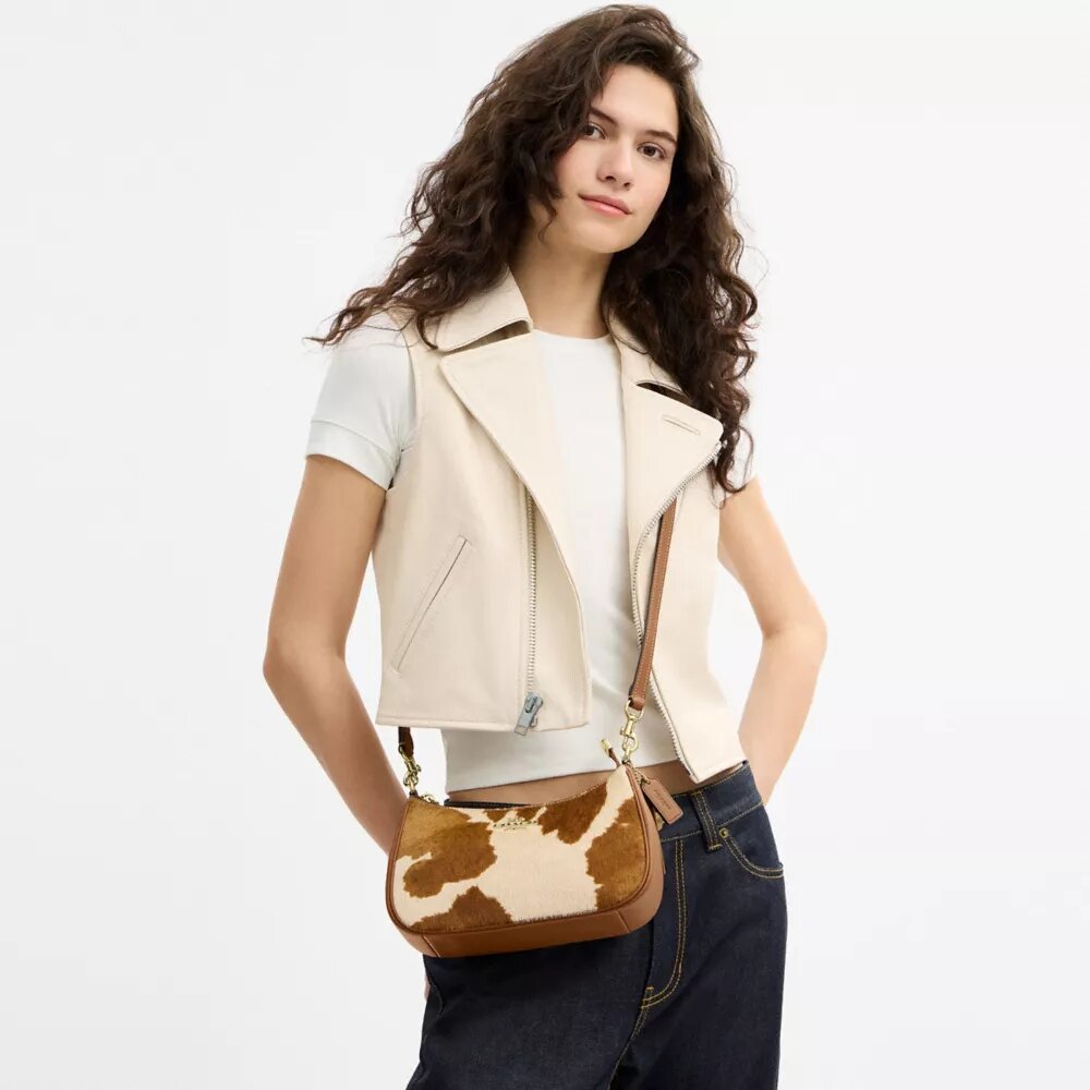 Borsa a spalla Teri in pelle di vitello con stampa bovina