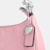 Borsa a spalla Teri in pelle firmata con ciondolo a forma di cuore