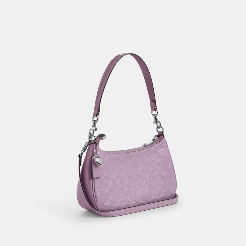 Borsa a spalla Teri in pelle firmata con ciondolo a forma di cuore