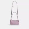 Borsa a spalla Teri in pelle firmata con ciondolo a forma di cuore