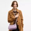 Borsa a spalla Teri in pelle firmata con ciondolo a forma di cuore