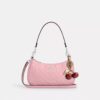 Borsa a spalla Teri in pelle firmata con ciondolo a forma di cuore