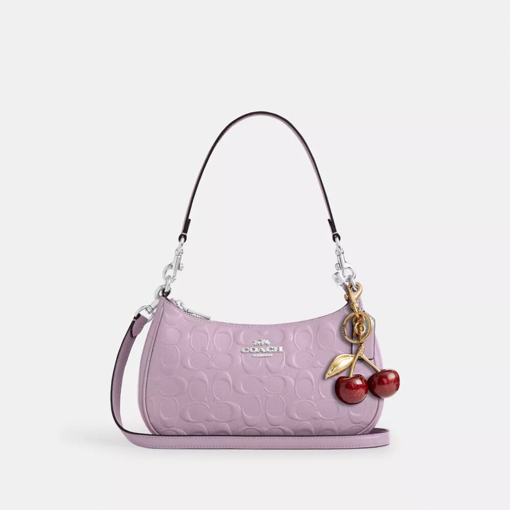 Borsa a spalla Teri in pelle firmata con ciondolo a forma di cuore