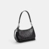 Borsa a spalla Teri in pelle Signature con ciondolo a forma di cuore