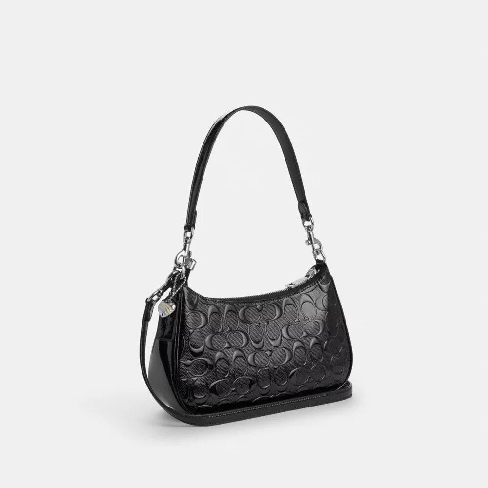 Borsa a spalla Teri in pelle Signature con ciondolo a forma di cuore