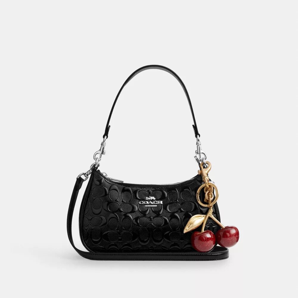 Borsa a spalla Teri in pelle Signature con ciondolo a forma di cuore