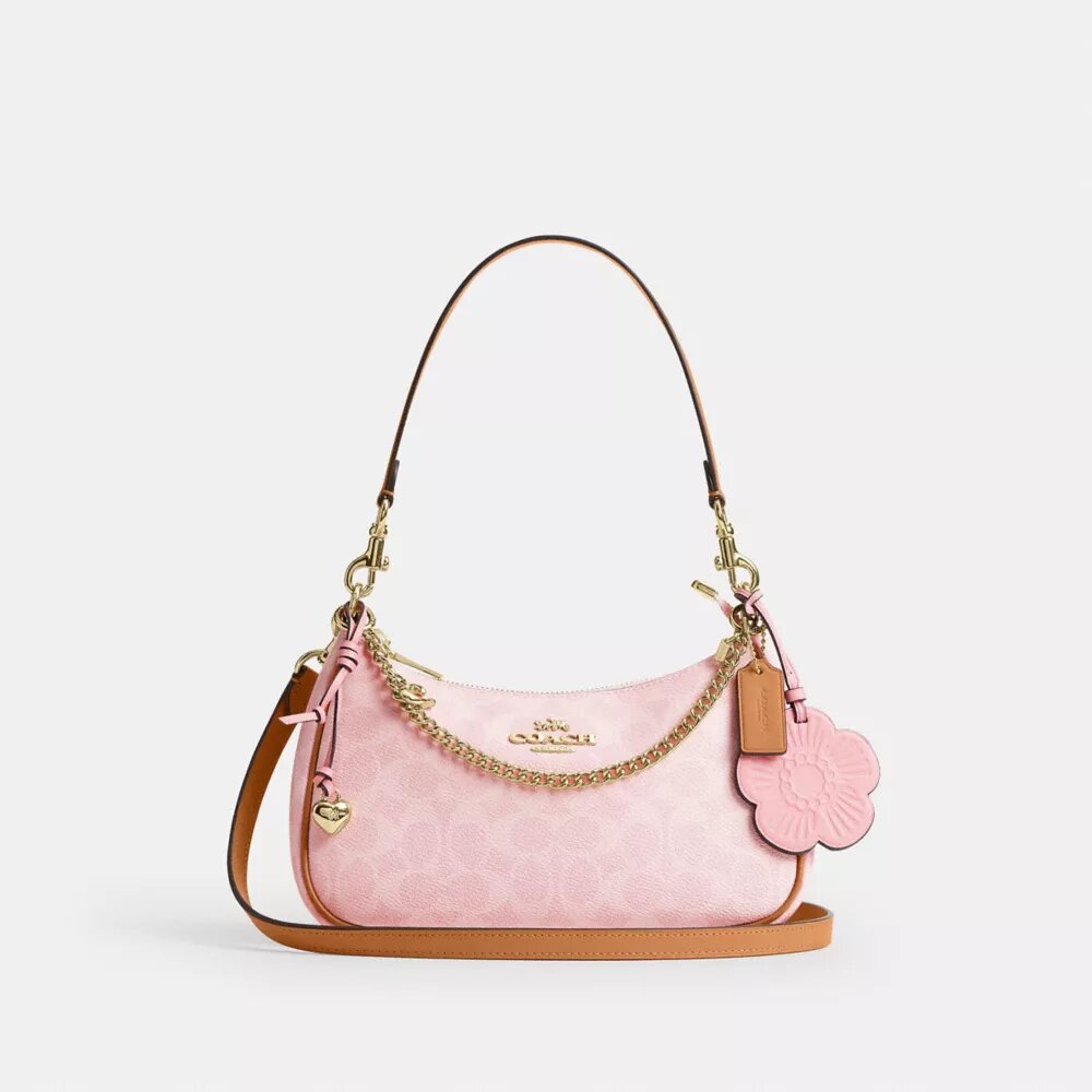 Borsa a spalla Teri in Signature Canvas con ciondoli
