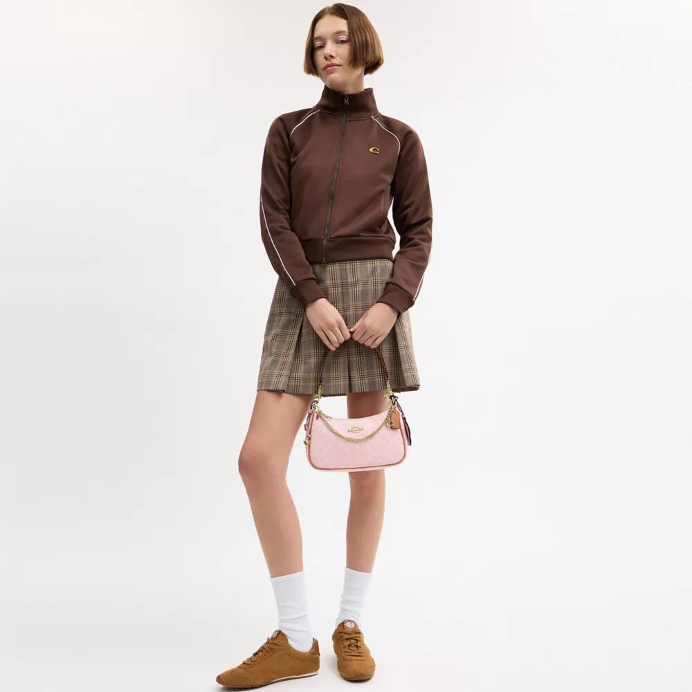 Borsa a spalla Teri in Signature Canvas con ciondoli