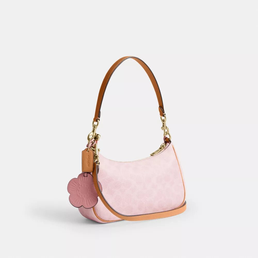 Borsa a spalla Teri in Signature Canvas con ciondoli