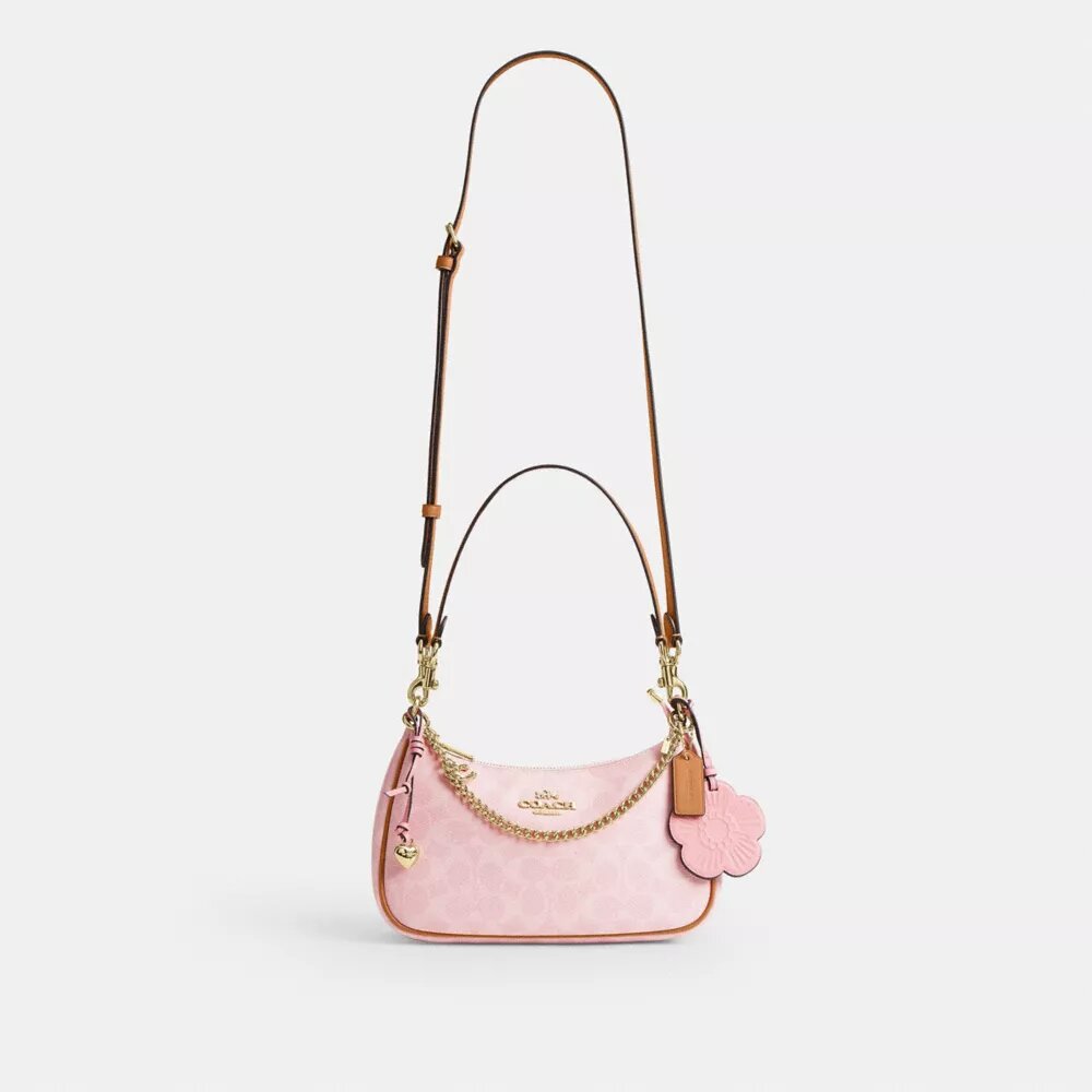 Borsa a spalla Teri in Signature Canvas con ciondoli
