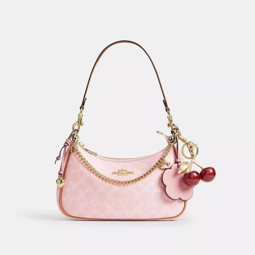 Borsa a spalla Teri in Signature Canvas con ciondoli