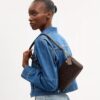 Borsa a tracolla Audrey in Signature Canvas