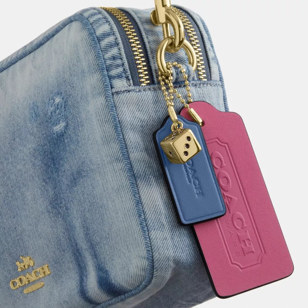 Borsa a tracolla Carey in denim "Loved" con ciondoli